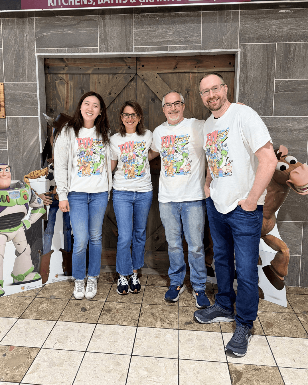 PSJ Orthodontics team posing with Toy Story decorations