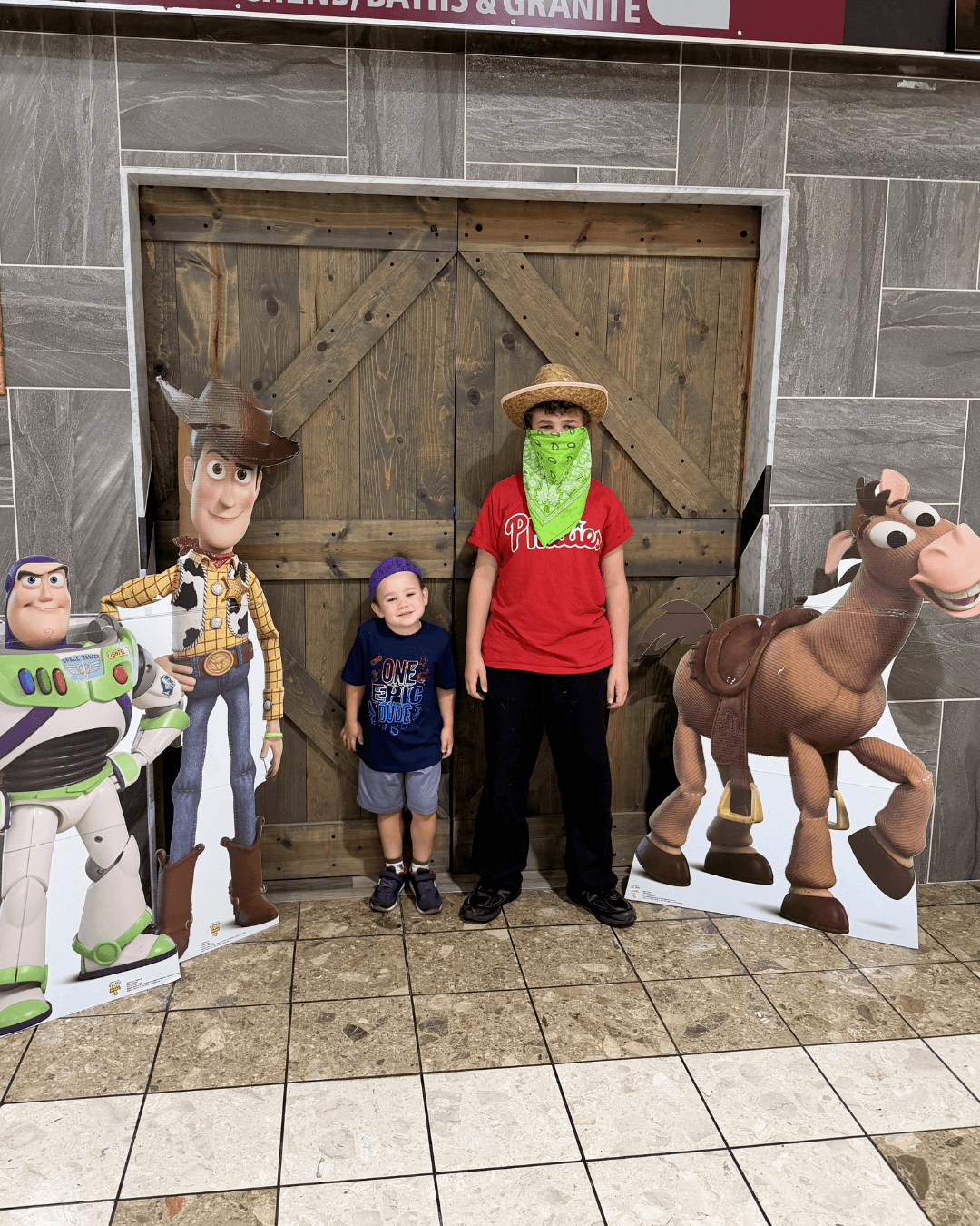 Guests posing with Toy Story characters at movie morning